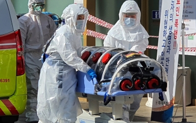 Corona COVID-19: China Lapor 889 Kasus Baru, Kematian Lampaui 2.200