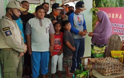 Purna Praja Aceh Bagikan Sembako ke Masyarakat Terdampak Covid-19