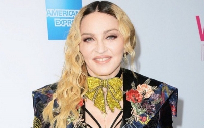 Madonna Kembali ke Warner Records