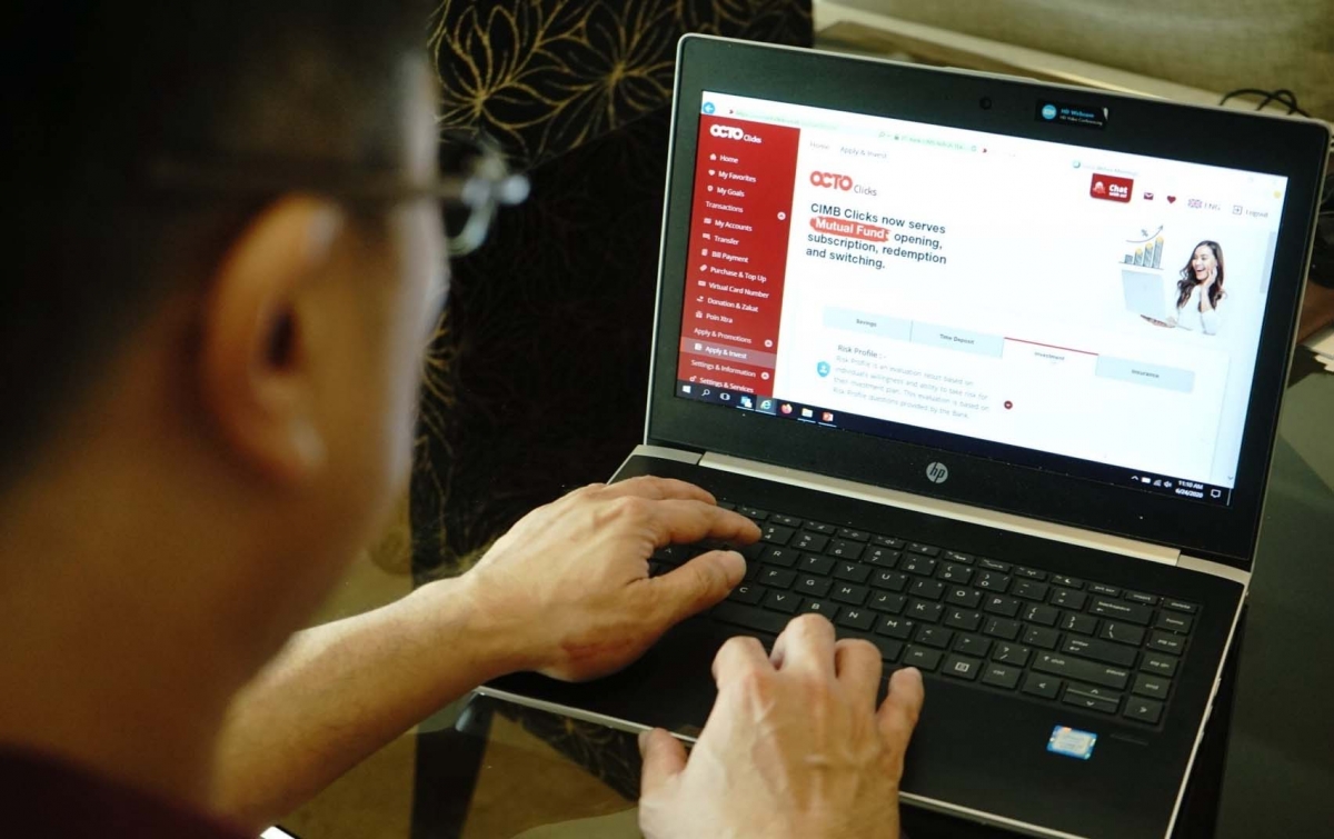 OCTO Clicks Permudah Pengguna Transfer Massal