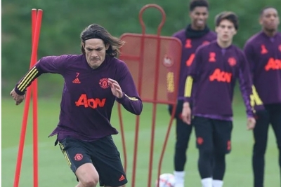 MU Tak Membawa Maguire dan Cavani ke Paris