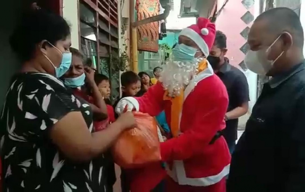 Berbagi Berkah Natal di Kampung Sejahtera