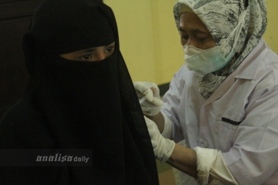 Foto: Vaksinasi Imigran di Kota Medan