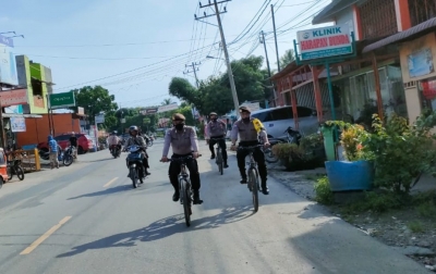Pantau Kamtibmas, Kanit Sabhara Polsek Padang Bolak Patroli Bersepeda