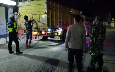 Antisipasi PMK, Polres Langkat dan Aceh Tamiang Lakukan Penyekatan