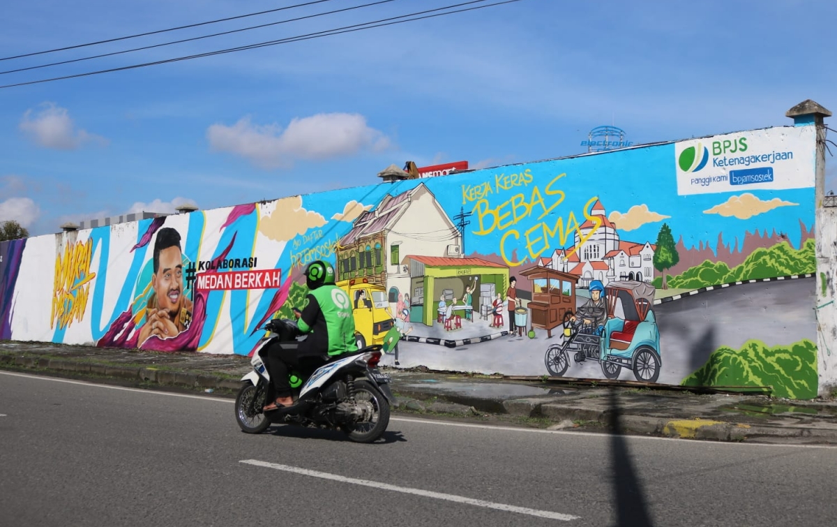 BPJamsostek Mengingatkan Pentingnya Jaminan Sosial Bagi Pekerja Rentan Lewat Mural