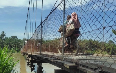 Jembatan Gantung Sarana Penyeberangan Penopang Hidup Masyarakat