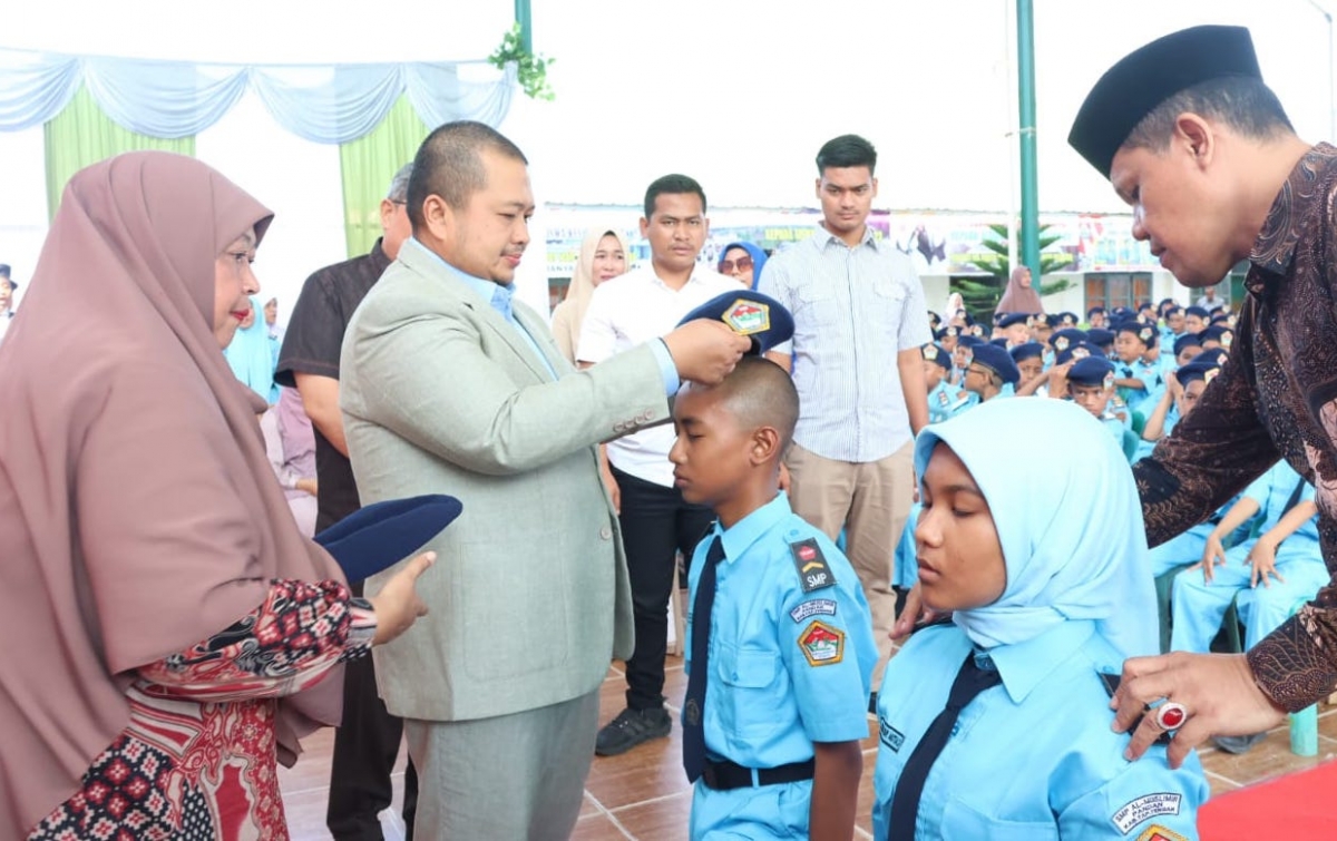 Dolly Pasaribu Hadiri Pelantikan Siswa-Siswi Baru SMPS Al Muslimin