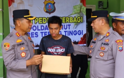 Berbagi Kebahagiaan, Kapolres Tebingtinggi Salurkan Bansos