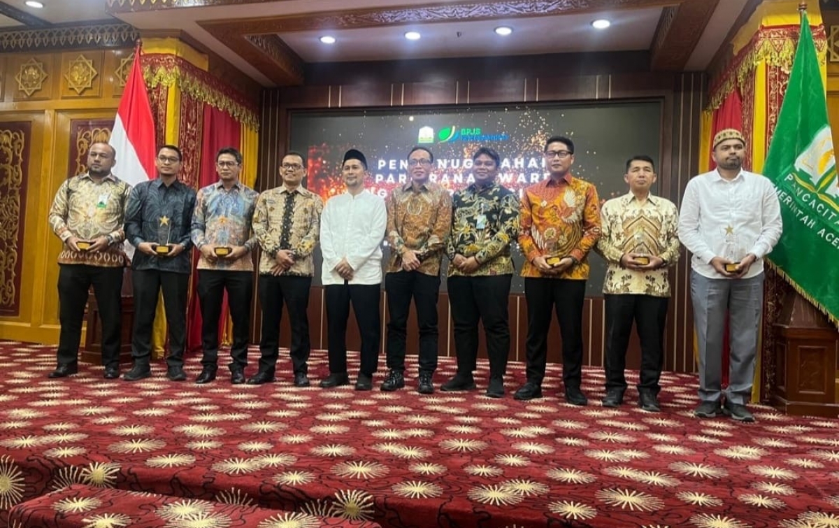 Komitmen Perlindungan Pekerja, Banda Aceh dan Pupuk Iskandar Muda Raih Anugerah Tertinggi Paritrana Award 2025