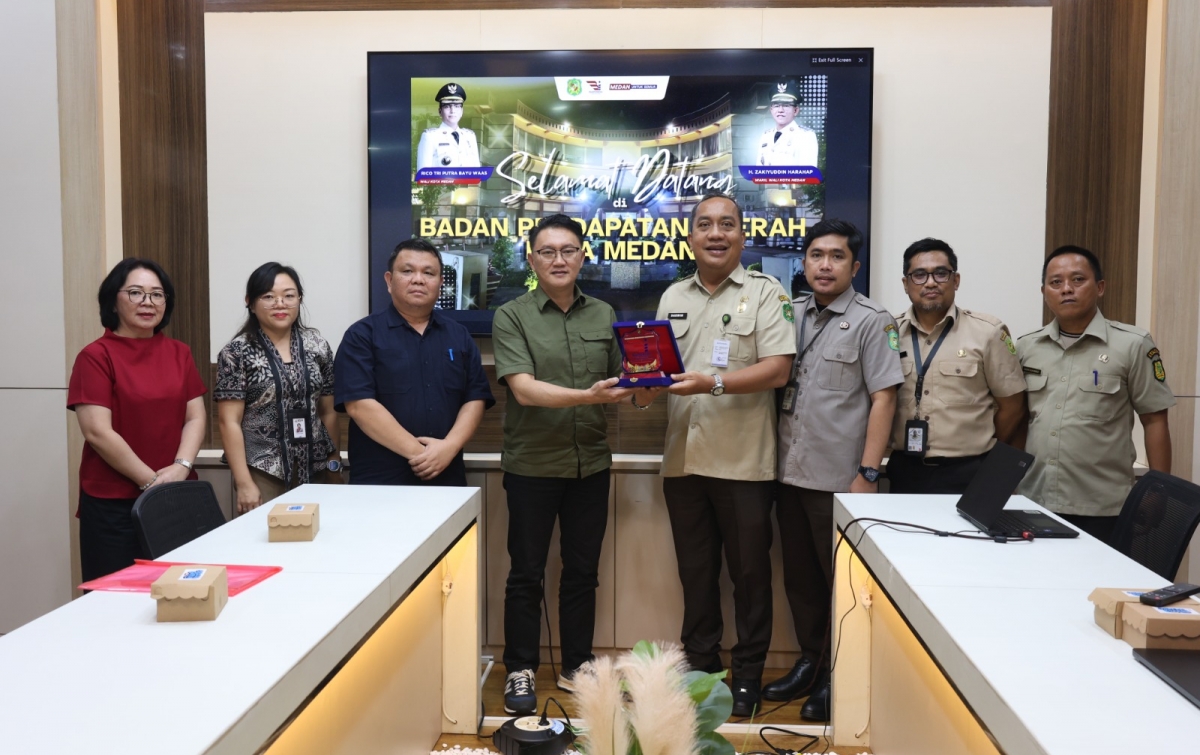 Bapenda Medan Terima Kunjungan Studi Komparasi Bapenda Manado Terkait Implementasi QRESTO