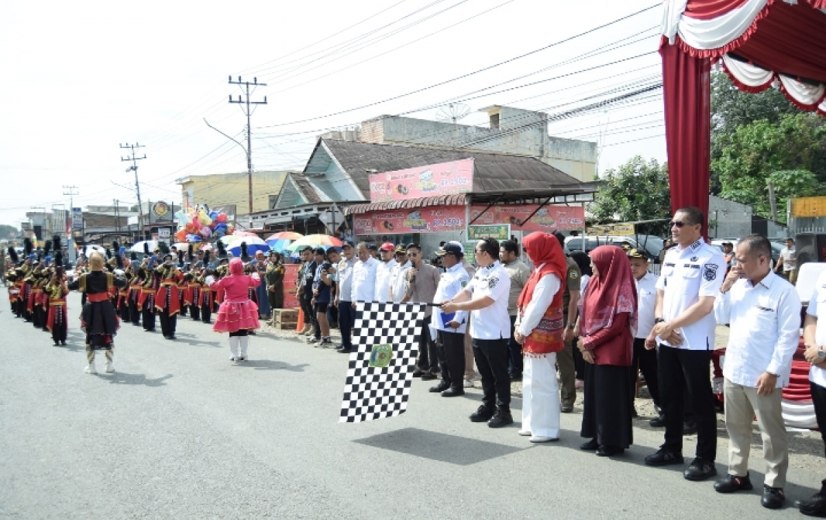 Bupati Putra Mahkota Lepas 57 Grub Marching Band Perebutkan Tropi TP PKK Palas